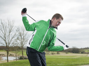 Stretch your arms and shoulders to improve your rotation in colder weather. 